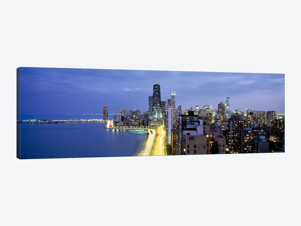 Skyscrapers lit up at the waterfront, Lake Shore Drive, Chicago, Cook County, Illinois, USA by Panoramic Images 1-piece Canvas Print