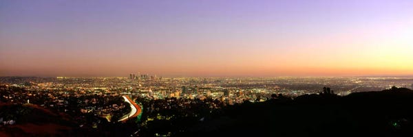 Hollywood: Aerial view of buildings in a city at dusk from Hollywood HillsHollywood, City of Los Angeles, California, USA by Panoramic Images
