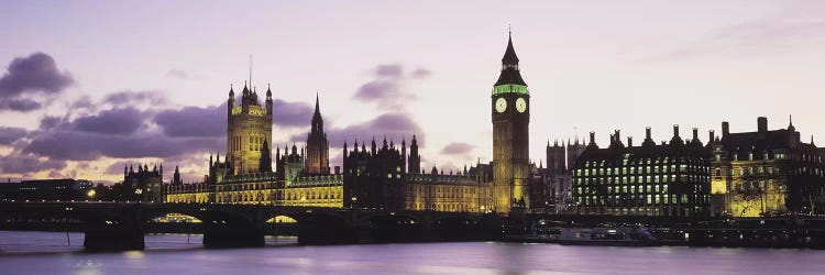 Buildings lit up at duskBig Ben, Houses of Parliament, Thames River, City of Westminster, London, England