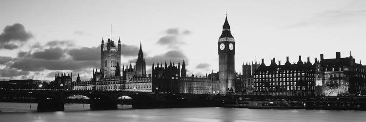 Buildings lit up at dusk, Big Ben, Houses of Parliament, Thames River, City of Westminster, London, England (black & white)