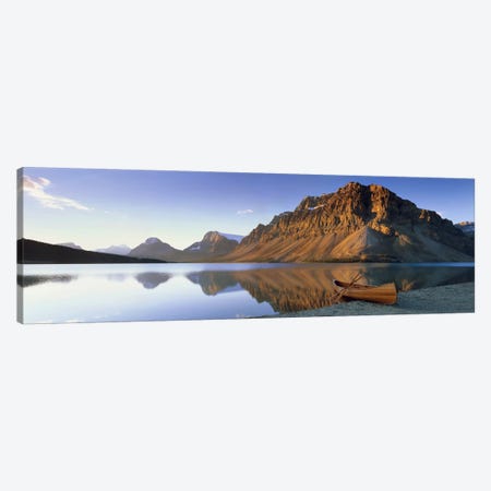 Lone Canoe, Bow Lake, Banff National Park, Alberta, Canada Canvas Print #PIM6617} by Panoramic Images Canvas Art