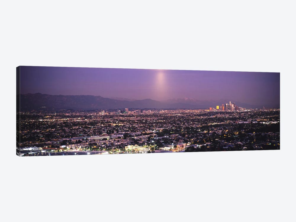 Buildings in a city lit up at dusk, Hollywood, San Gabriel Mountains, City Of Los Angeles, Los Angeles County, California, USA by Panoramic Images 1-piece Canvas Art Print