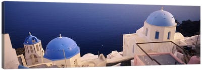 High angle view of blue domed church at the coast, Oia, Santorini, Greece Canvas Art Print - Dome Art