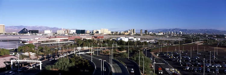 Roads in a city with an airport in the backgroundMcCarran International Airport, Las Vegas, Clark County, Nevada, USA