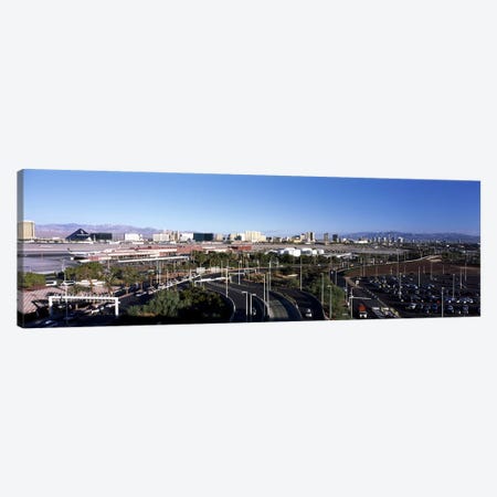 Roads in a city with an airport in the backgroundMcCarran International Airport, Las Vegas, Clark County, Nevada, USA Canvas Print #PIM6697} by Panoramic Images Canvas Artwork