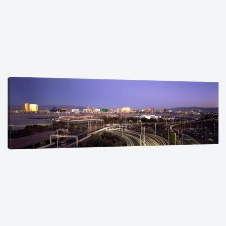 Roads in a city with an airport in the backgroundMcCarran International Airport, Las Vegas, Clark County, Nevada, USA Canvas Print #PIM6699} by Panoramic Images Canvas Art Print