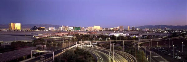 Airports: Roads in a city with an airport in the backgroundMcCarran International Airport, Las Vegas, Clark County, Nevada, USA by Panoramic Images