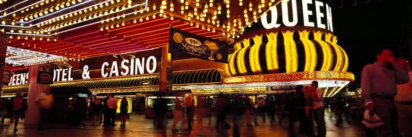 Gambling: Casino lit up at night, Four Queens, Fremont Street, Las Vegas, Clark County, Nevada, USA by Panoramic Images