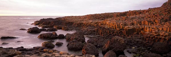 Wonders Of The World: Basalt columns of Giant's Causeway, Antrim Coast, Northern Ireland. by Panoramic Images