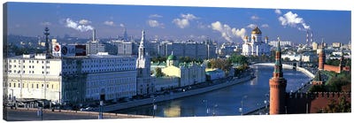 Buildings at the waterfront, Moskva River, Moscow, Russia Canvas Art Print