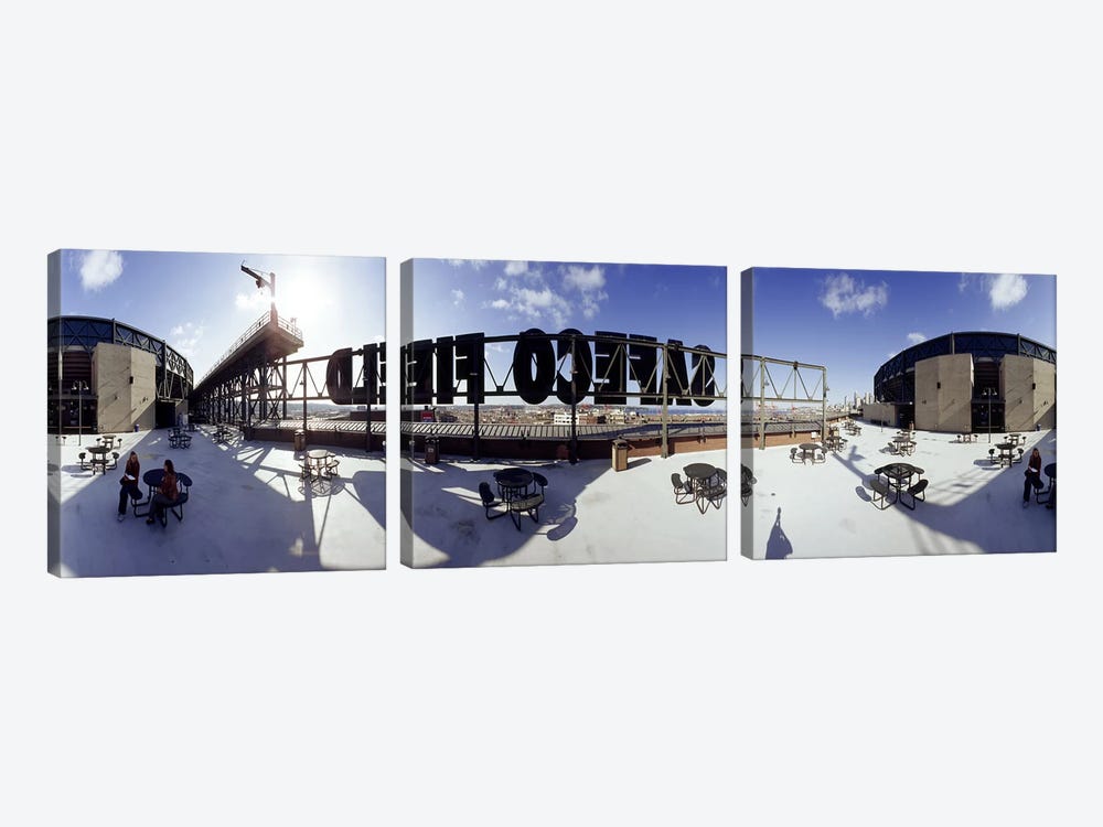 Tourist sitting on a roof outside a baseball stadium, Seattle, King County, Washington State, USA by Panoramic Images 3-piece Art Print