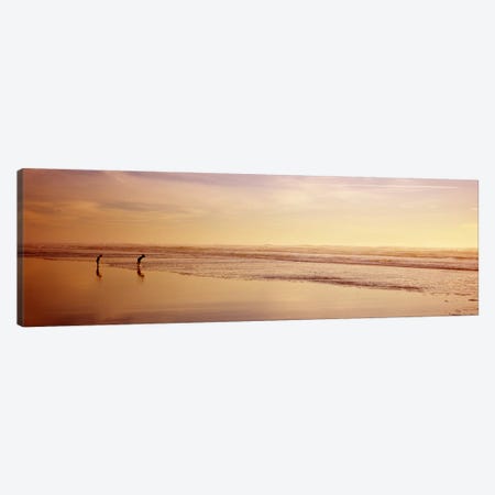 Two children playing on the beach, San Francisco, California, USA Canvas Print #PIM6999} by Panoramic Images Canvas Wall Art