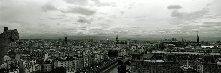 Aerial view of a river passing through a city from Notre Dame de Paris, Seine River, Paris, Ile-de-France, France