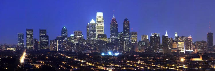 Buildings lit up at night in a cityComcast Center, Center City, Philadelphia, Philadelphia County, Pennsylvania, USA