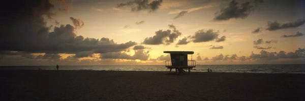 Lake Sunrises & Sunsets: Silhouette of a lifeguard hut on the beach, South Beach, Miami Beach, Miami-Dade County, Florida, USA by Panoramic Images