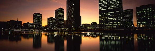 Buildings lit up at dusk, Oakland, Alameda County, California, USA