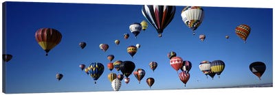 Hot air balloons floating in skyAlbuquerque International Balloon Fiesta, Albuquerque, Bernalillo County, New Mexico, USA Canvas Art Print