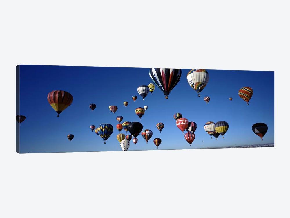 Hot air balloons floating in skyAlbuquerque International Balloon Fiesta, Albuquerque, Bernalillo County, New Mexico, USA by Panoramic Images 1-piece Canvas Print
