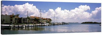 Boats docked in a bay, Cabbage Key, Sunshine Skyway Bridge in Distance, Tampa Bay, Florida, USA Canvas Art Print - Tampa Bay Art