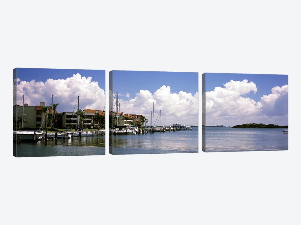 Boats docked in a bay, Cabbage Key, Sunshine Skyway Bridge in Distance, Tampa Bay, Florida, USA by Panoramic Images 3-piece Canvas Art Print