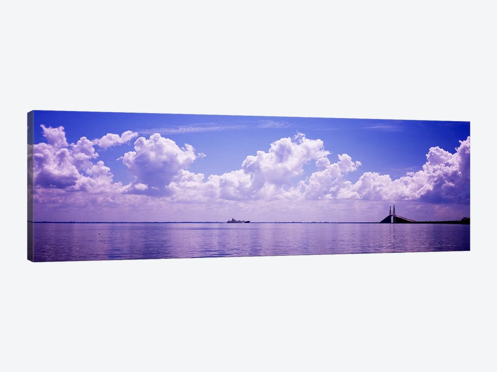Sea with a container ship and a suspension bridge in distant, Sunshine Skyway Bridge, Tampa Bay, Gulf of Mexico, Florida, USA by Panoramic Images 1-piece Canvas Artwork