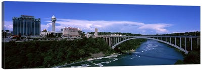 Bridge across a riverRainbow Bridge, Niagara River, Niagara Falls, New York State, USA Canvas Art Print - Wonders of the World