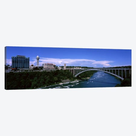 Bridge across a riverRainbow Bridge, Niagara River, Niagara Falls, New York State, USA Canvas Print #PIM7222} by Panoramic Images Canvas Art Print