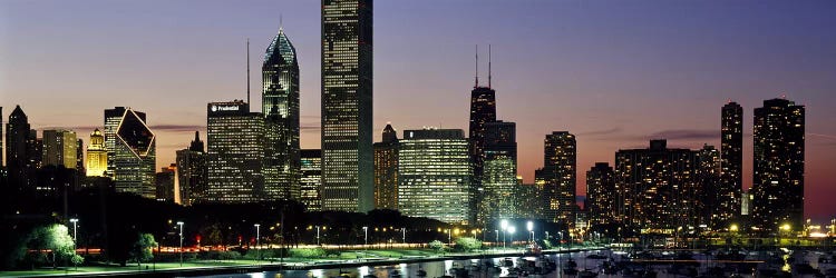 Buildings lit up at duskLake Michigan, Chicago, Cook County, Illinois, USA