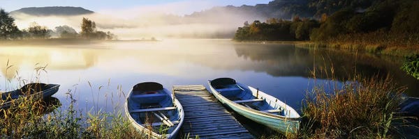 Rowboats: Rowboats at the lakesideEnglish Lake District, Grasmere, Cumbria, England by Panoramic Images