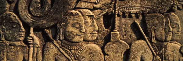 Holy & Sacred Sites: Sculptures in a temple, Bayon Temple, Angkor, Cambodia by Panoramic Images