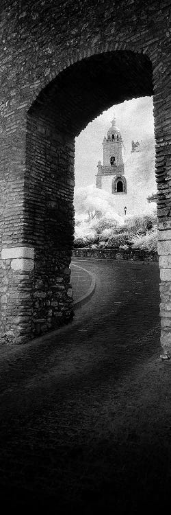 Church viewed through an archway, Puerta Del Sol, Medina Sidonia, Cadiz, Andalusia, Spain