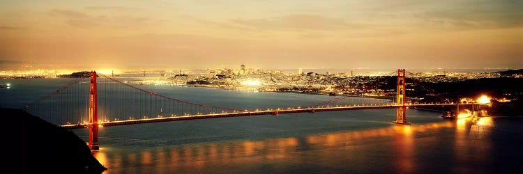 Suspension bridge lit up at dusk, Golden Gate Bridge, San Francisco Bay, San Francisco, California, USA