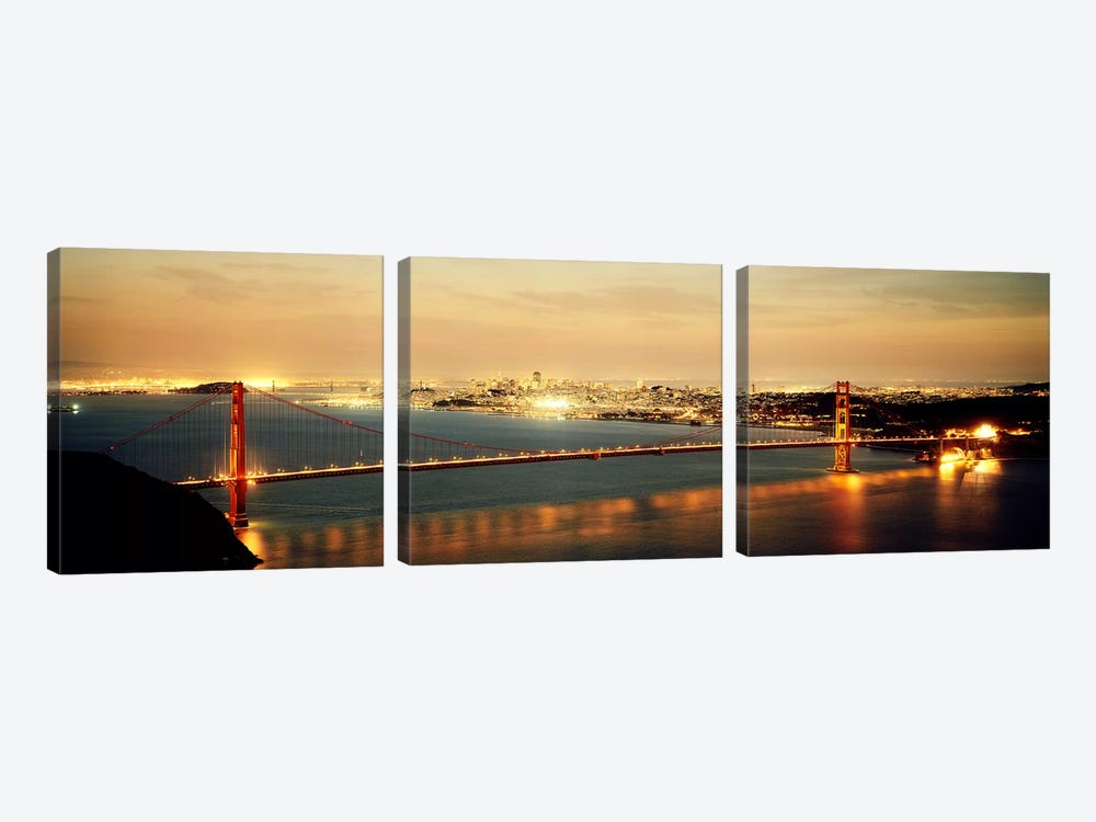 Suspension bridge lit up at dusk, Golden Gate Bridge, San Francisco Bay, San Francisco, California, USA by Panoramic Images 3-piece Canvas Wall Art