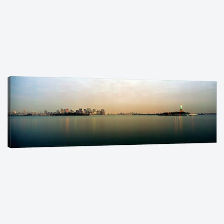 River with the city skyline and Statue of Liberty in the background, New York Harbor, New York City, New York State, USA Canvas Print #PIM7366} by Panoramic Images Canvas Art Print
