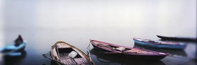 Row boats in a riverGanges River, Varanasi, Uttar Pradesh, India by Panoramic Images canvas print