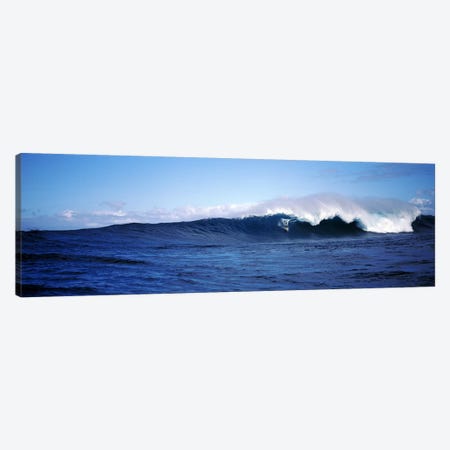 Distant View Of A Surfer On A Cresting Ocean Wave Canvas Print #PIM7417} by Panoramic Images Art Print