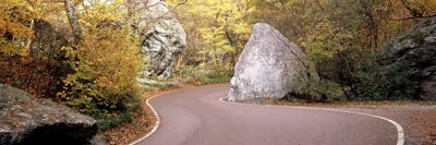 Road curving around a big boulder, Stowe, Lamoille County, Vermont, USA by Panoramic Images framed canvas print