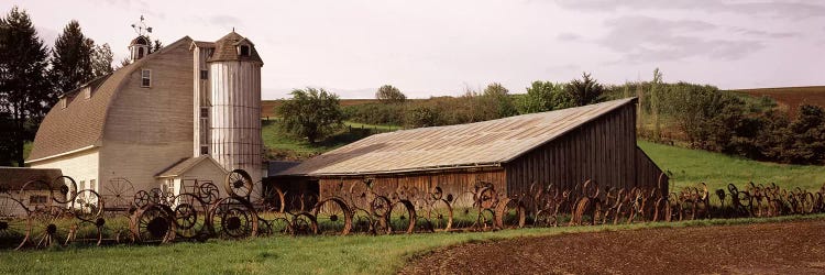 Old barn with a fence made of wheels, Palouse, Whitman County, Washington State, USA