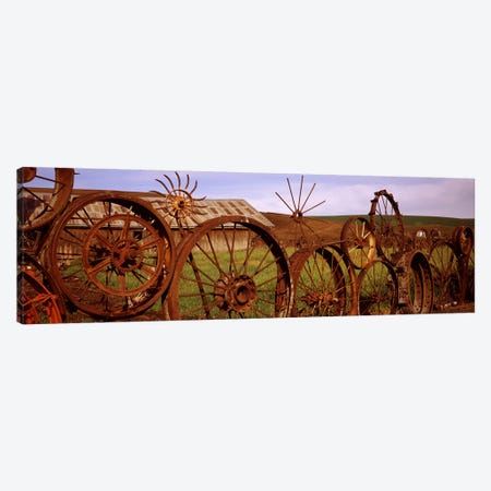 Old barn with a fence made of wheels, Palouse, Whitman County, Washington State, USA #2 Canvas Print #PIM7529} by Panoramic Images Canvas Artwork