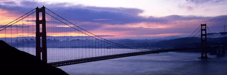 Silhouette of a suspension bridge at dusk, Golden Gate Bridge, San Francisco, California, USA