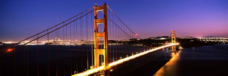 Suspension bridge lit up at dusk, Golden Gate Bridge, San Francisco, California, USA