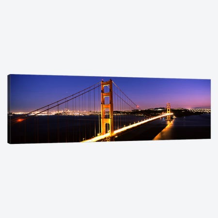 Suspension bridge lit up at dusk, Golden Gate Bridge, San Francisco, California, USA Canvas Print #PIM7578} by Panoramic Images Art Print