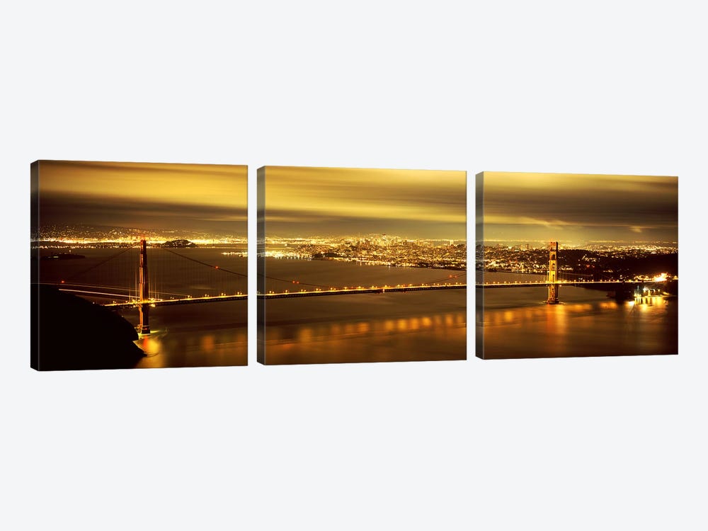 Suspension bridge lit up at dusk, Golden Gate Bridge, San Francisco, California, USA by Panoramic Images 3-piece Canvas Artwork