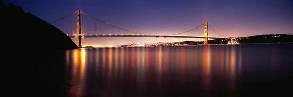 Golden Gate Bridge: Suspension bridge lit up at dusk, Golden Gate Bridge, San Francisco Bay, San Francisco, California, USA #3 by Panoramic Images
