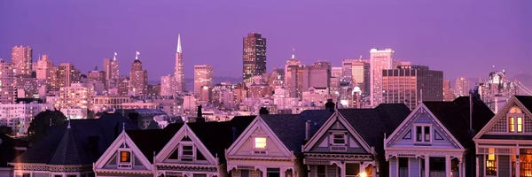 San Francisco Skylines: Skyscrapers lit up at night in a city, San Francisco, California, USA by Panoramic Images