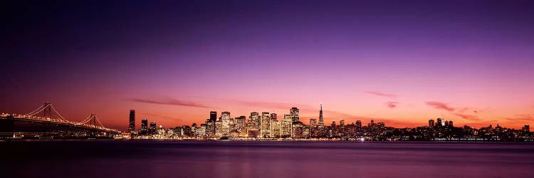 Suspension bridge with city skyline at dusk, Bay Bridge, San Francisco Bay, San Francisco, California, USA