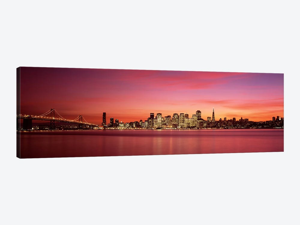 Suspension bridge with city skyline at duskBay Bridge, San Francisco Bay, San Francisco, California, USA by Panoramic Images 1-piece Canvas Art Print