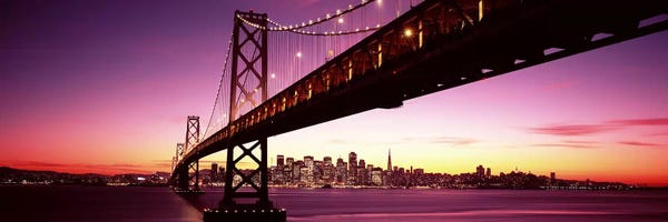 San Francisco: Bridge across a bay with city skyline in the background, Bay Bridge, San Francisco Bay, San Francisco, California, USA by Panoramic Images