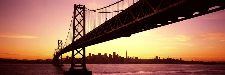 Bridge across a bay with city skyline in the backgroundBay Bridge, San Francisco Bay, San Francisco, California, USA