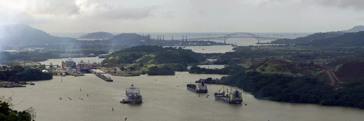 Aerial View Of The Panama Canal Featuring The Miraflores Locks And Bridge Of Americas